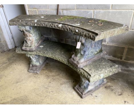 A pair of reconstituted stone curved garden bench seats, length 160cm, width 40cm, height 42cm