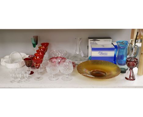 A quantity of glassware, including two Orrefors bowls (one boxed), a large iridescent centrepiece bowl, Waterford Crystal, in