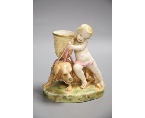 A Royal Worcester figure group of a child and dog, height 13cmCONDITION: Basket shallow chips about rim; edge of base with tw