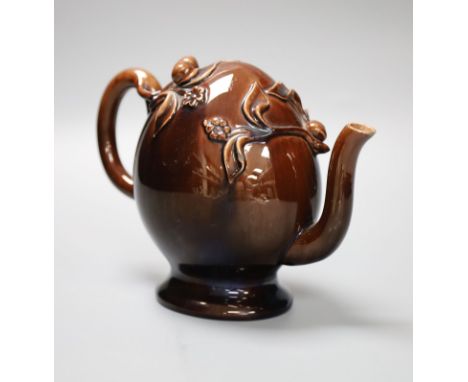 A small Brameld Cadogan teapot, relief moulded and gilded over a brown glaze, impressed mark, height 15cm, minor spout chipCO