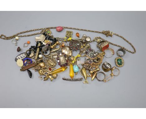 A quantity of assorted mainly 19th century jewellery including mourning brooches, fob seals, stick pins, 9ct rings, 14k and c