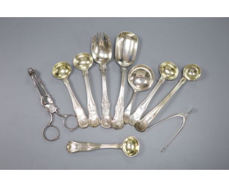 Seven various 19th century silver condiment spoons, a caddy spoon and two pairs of sugar nips including Georgian(a.f.), 8oz.