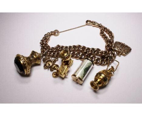 9 ct gold charm bracelet including 10g tractor charm. 73.8g