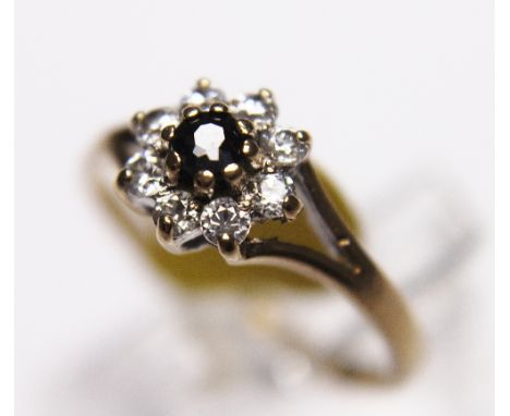 9 ct gold sapphire and CZ cluster ring, size N