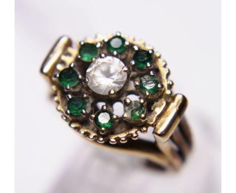 Ladies fashion ring with green and white stones A/F