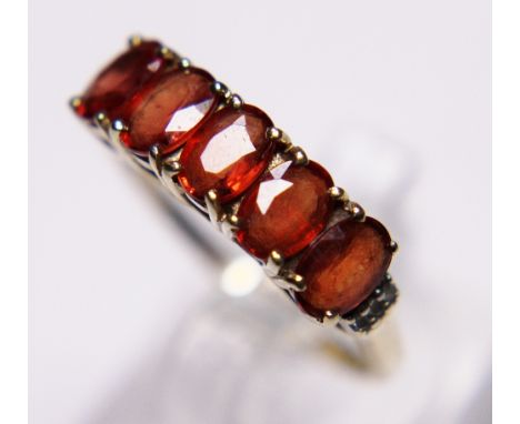 9 K gold sunset sapphire ring, size T