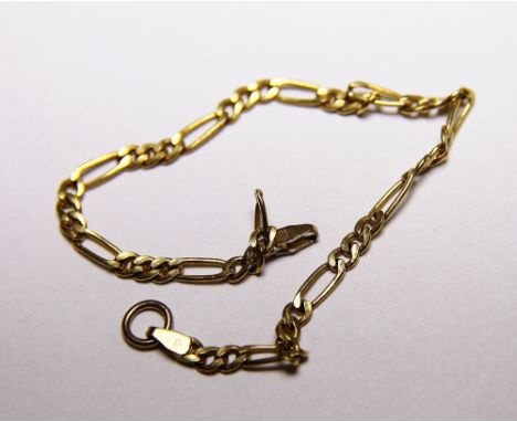 9 ct gold bracelet. L: 16.5 cm and a 9 ct gold ring shrinker