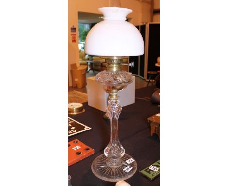Cut glass paraffin lamp with star cut base H: 76 cm to top of chimney