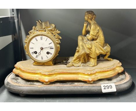 A 19thC French gilt metal mantel clock, W. 35cm.