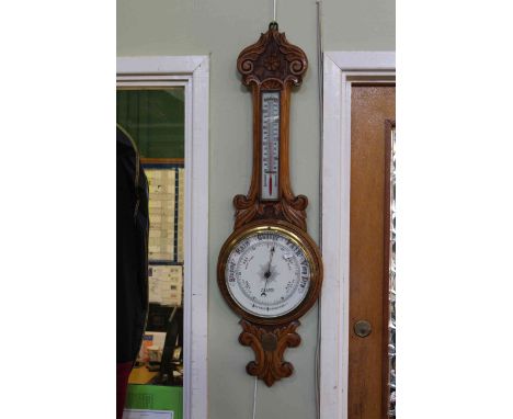 Late Victorian carved oak aneroid barometer, signed H. Lamp, West Hartlepool, with presentation plaque dated 1898