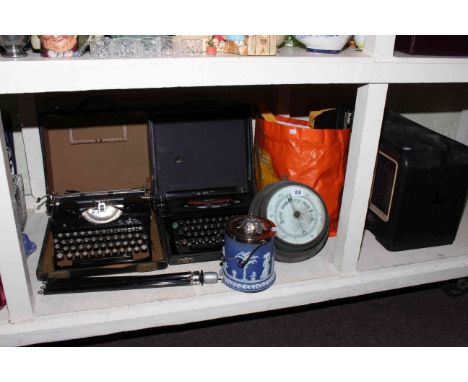 Vintage radio, two vintage typewriters, assorted cameras, biscuit barrel and barometer