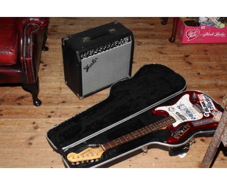 Fender amplifier and Tanglewood guitar with case