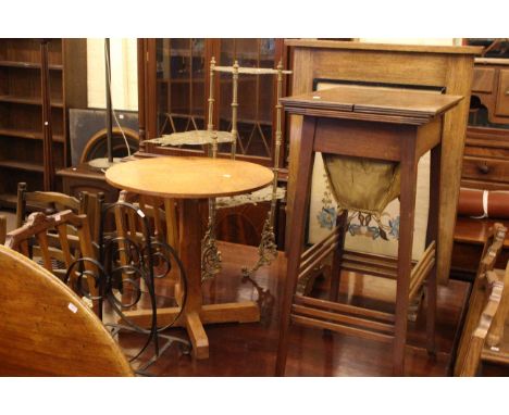 Mahogany sewing table, needlework firescreen, brass cakestand, lamp table and wrought iron magazine stand