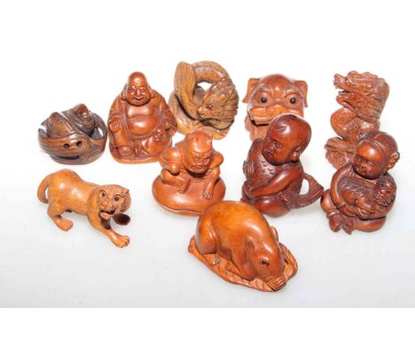 Collection of ten carved wood netsuke, mostly signed