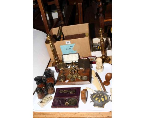 Tray lot and box with postal scales, binoculars, microscope, brass candlesticks, etc