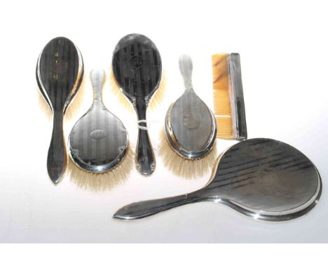 Silver dressing table brushes, comb and mirror, six pieces in all