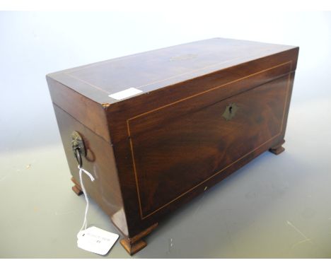 A 19th Century mahogany tea caddy on bracket feet.