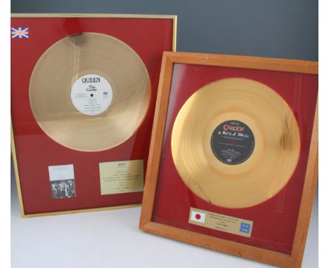 Two framed Queen EMI golden records; The Game presented to Paul Prenter for more than 100,000 sales of 'The Game', the other 