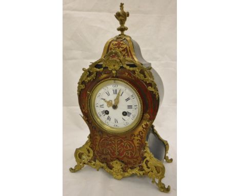 A French boulle work mantle clock with Roman numerals to the enamelled dial, the back stamped Lep Japy Medailles CONDITION RE