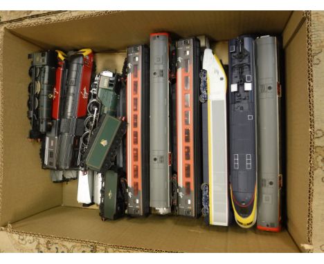 A quantity of various Hornby 00 rolling stock including Cadbury Castle 4-6-0 loco and tender, Tornado 4-6-2 loco and tender, 
