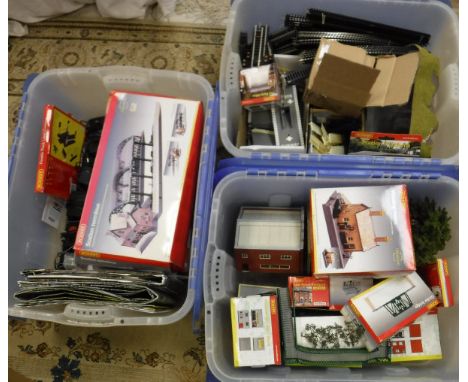 Three plastic containers of various Hornby 00 accessories and track including station terminus, waiting room, girder bridge, 