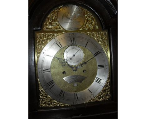 An 18th Century long case clock, the oak case (formerly lacquered) enclosing the eight day movement with brass arch dial, the