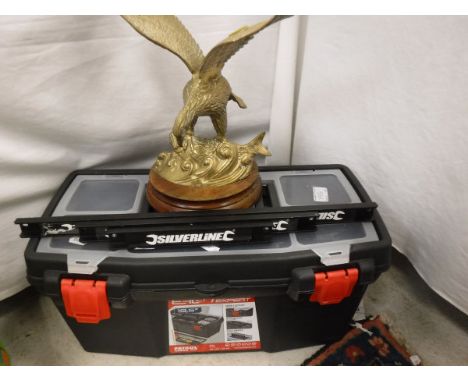 A toolbox and tools including a magnetic strip for tools, a brass eagle ornament, a bag of cookery books together with 2 boxe