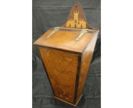 A 19th Century walnut and inlaid candle box, the hanger with inlaid castle decoration over the sloping lid, the front panel d