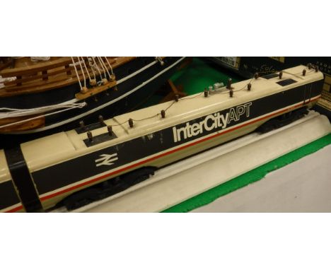 A large selection of various toys and models including model of an Intercity APT loco and carriages, three various boats, Dan