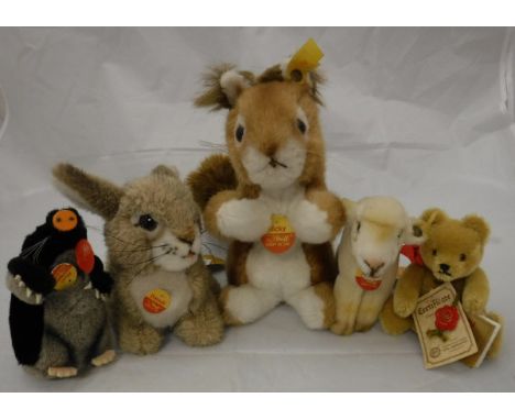A Steiff Dormili Rabbit Kitten, a Steiff Red Squirrel "Ricky", a small Steiff Lamb "Lamby", a Steiff Mole "Maxi", (all with b