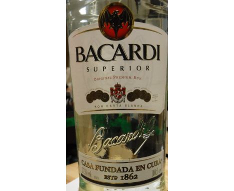 Three bottles Bacardi Rum 100 cl, one bottle Bacardi 70 cl, one bottle Bacardi 35 cl, one bottle Smirnoff Vodka 70 cl, one bo