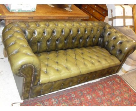 A 20th Century green buttoned leather upholstered Chesterfield sofa CONDITION REPORTS Please note this piece is a sofa bed, n