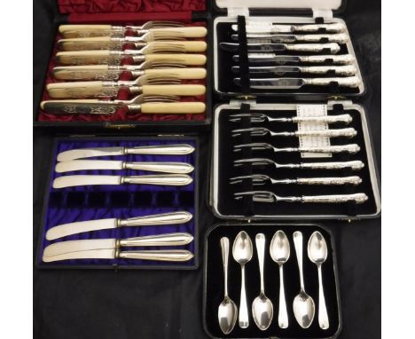 A cased set of six George V silver tea spoons (by Emile Viner of Sheffield 1931), a cased set of six silver handled tea knive