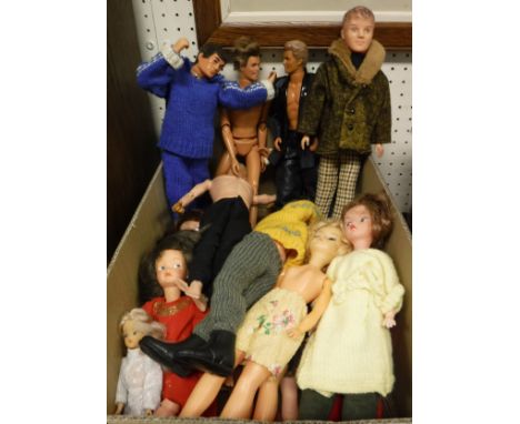A box of various dolls to include Palatoy, Hasbro circa 1964 Action Man  x 2 with real hair and gripping hands (brown hair), 