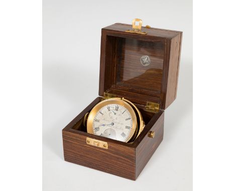Henri Grandjean maritime chronometer; England, 19th century.Carved wood and gilt metal.In need of restoration.It has damages 