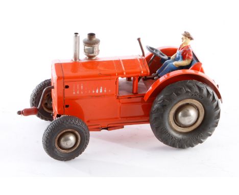 Gama Traktor, Blech, mit Fahrerfigur, Uhrwerk def., LS und Alterungsspuren, L 18,5, Z 3