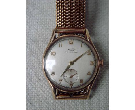 A Tissot 9ct gold cased manual wind Wrist Watch, the silvered 30mm dial with Arabic numerals, subsidiary seconds dial at 6, s