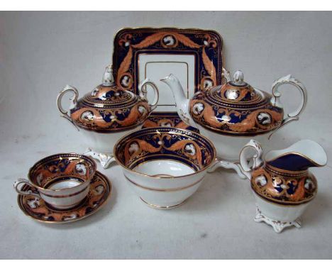 A Victorian Tea Service for ten places, Rockingham style, cobalt blue and tan foliate decoration with gilt highlights featuri