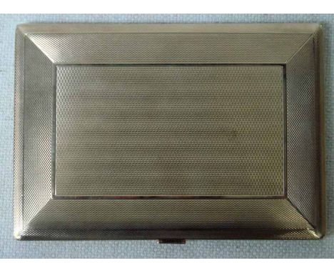 A mid century 9ct gold Cigarette Case, rectangular with engine turned outer surfaces, internally inscribed Charles Sutcliffe 