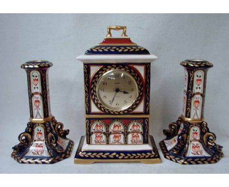 A Masons Ironstone Mantel Clock, 25cm high and a pair of Candlesticks, 19cm high, Masterpiece Series, limited edition (3) 