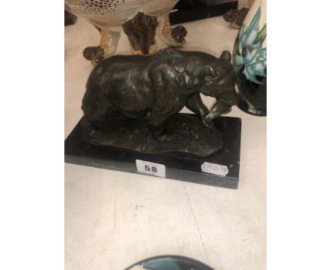 A bronze bear and fish