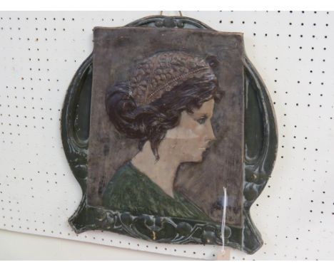 An Art Nouveau portrait plaque by Ernst Wahliss, Vienna, slip-cast earthenware with painted detail, impressed marks and incis
