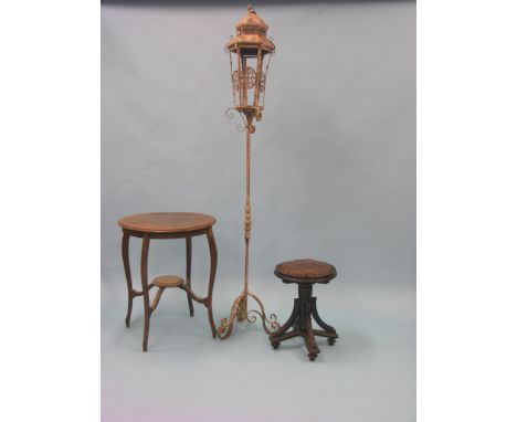 A Victorian ebonised wood stool, with circular, revolving seat, together with a wrought metal floor lamp, circular oak occasi