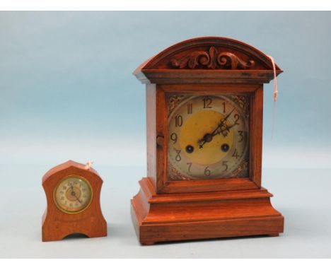 A Victorian mantel clock, traditional square dial with German gong-striking movement, with key and pendulum, in architectural