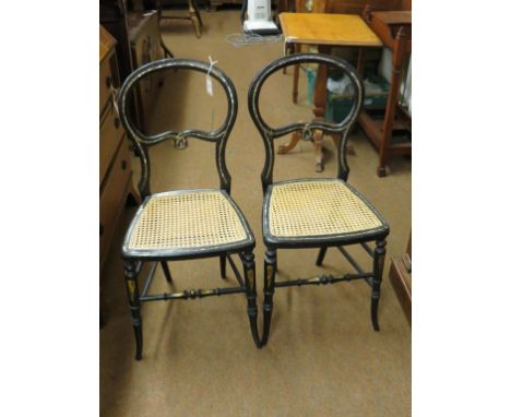 A pair of Victorian and ebonised mother of pearl bedroom chairs, with caned seats