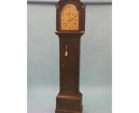 An early 19th century 8-day longcase clock, unsigned painted, arched dial, hood with fluted columns, in oak case, 6ft. 10in. 