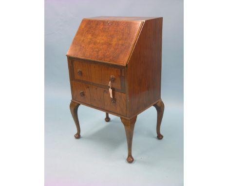 A burr walnut lady's bureau, enclosed fittings above two drawers, 2ft., together with an oak string-seated stool, oak magazin