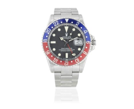 Rolex. A stainless steel automatic calendar bracelet watch with dual time zoneModel: GMT Master 'Pepsi'Reference: 1675Date: C