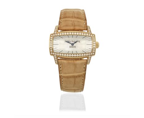 Patek Philippe. A lady's 18K gold and diamond set automatic wristwatchModel: Gondolo GemmaReference: 4991R-001Date: Purchased