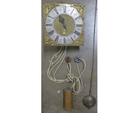 An early 18th Century longcase clock dial and movement by Wooley, Codnor, with pendulum and weight 